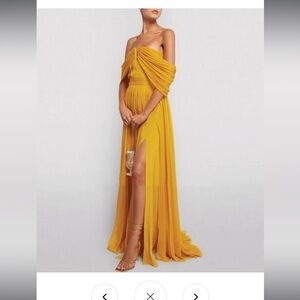Red carpet ready golden yellow strapless gown.
